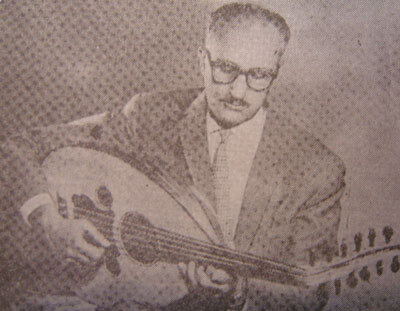 A man in suit and glasses playing an instrument.